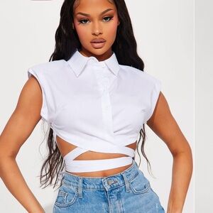 White cropped button down blouse. Cut small better for someone a size Large. NWT